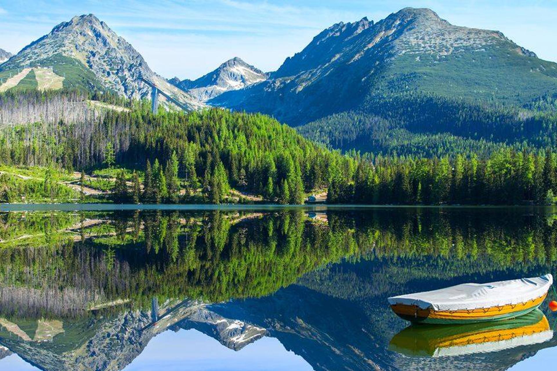 Walking path along a mountain lake near Štrbské Pleso in the High Tatras, Slovakia
