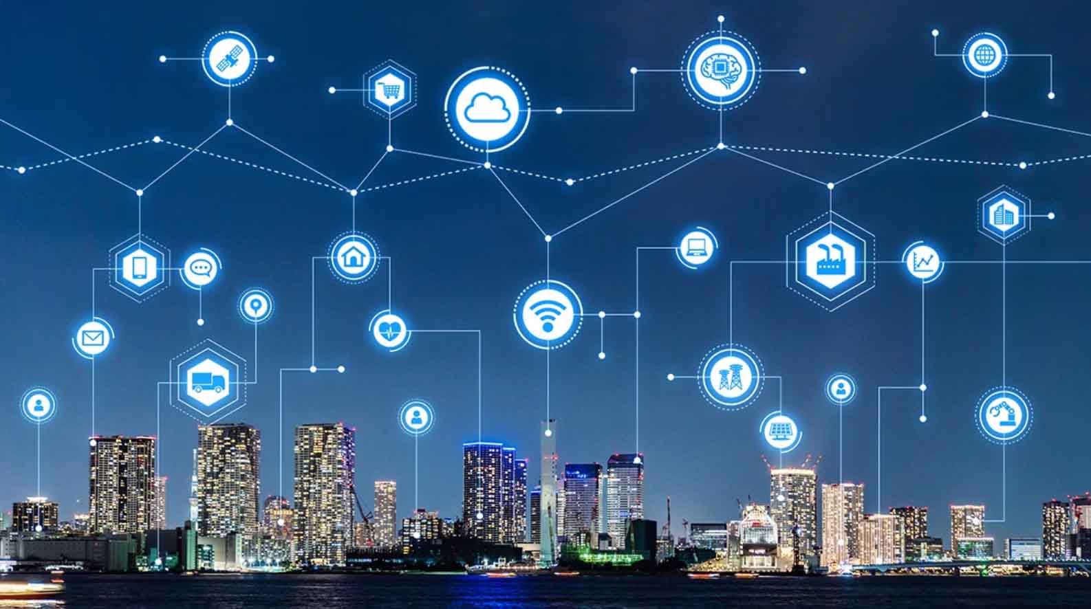 A city skyline at night overlaid with a network of connected technology icons