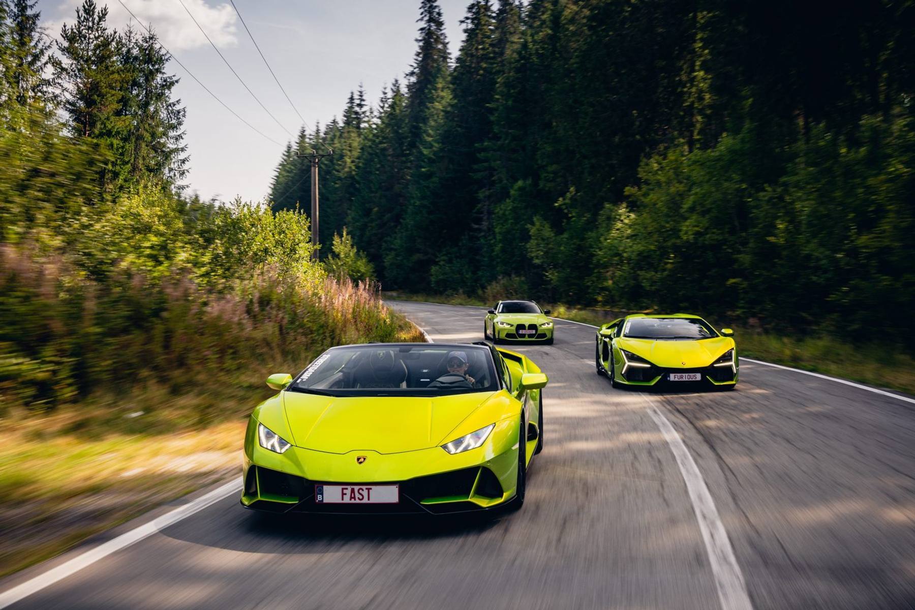 StreetGasm convoy of supercars on the road during a bespoke rally.