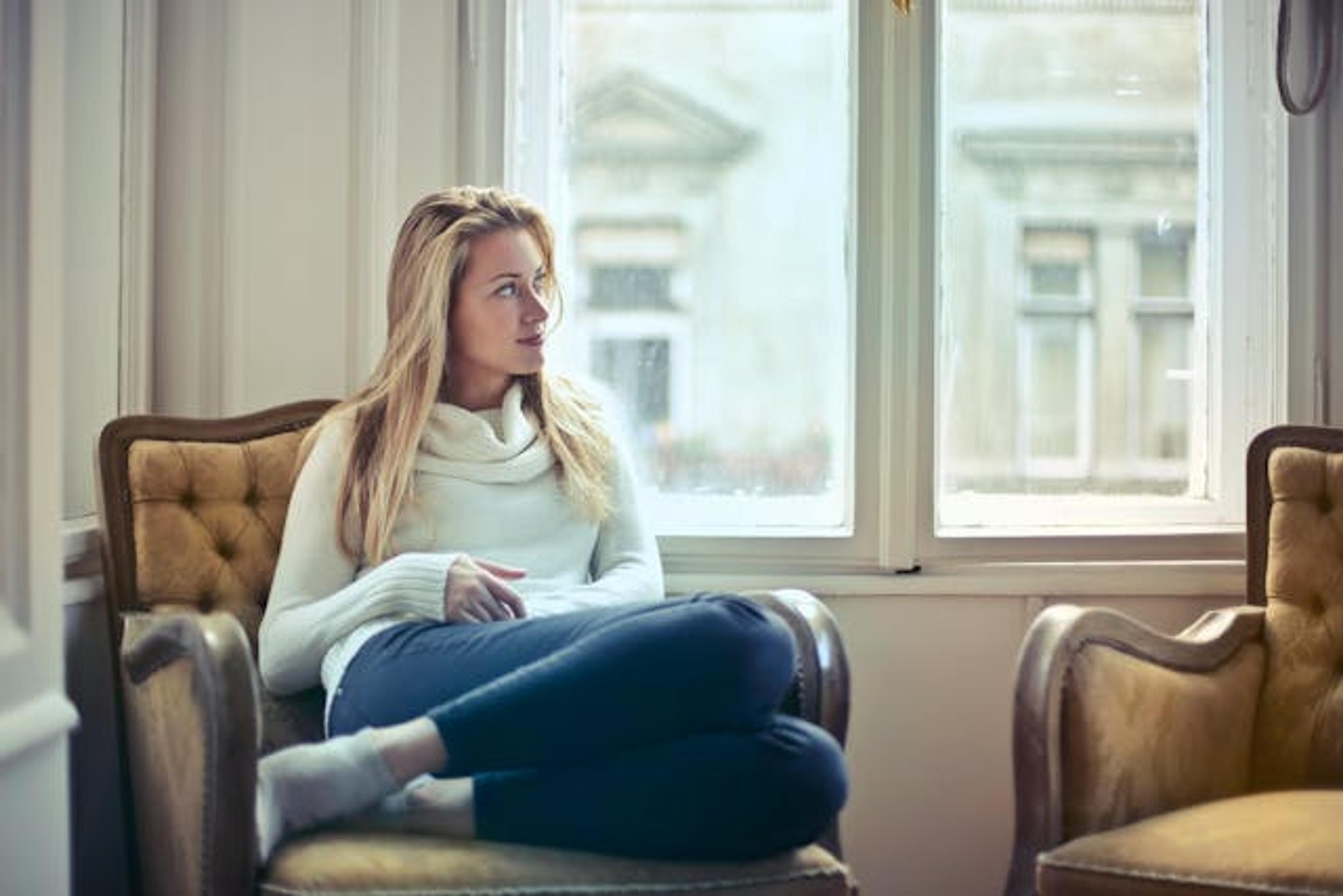 Woman sitting on a chair