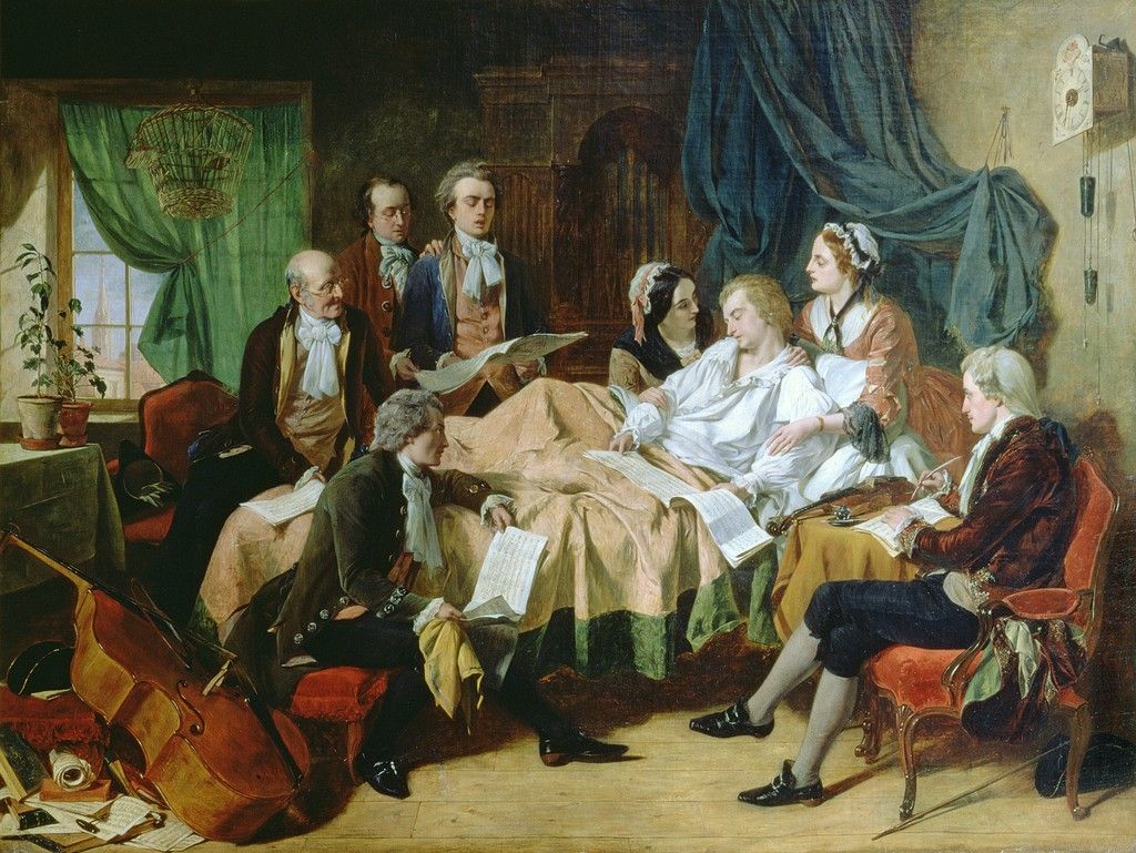 Dipinto di Henry Nelson O’Neil con Mozart a letto circondato da familiari e musicisti