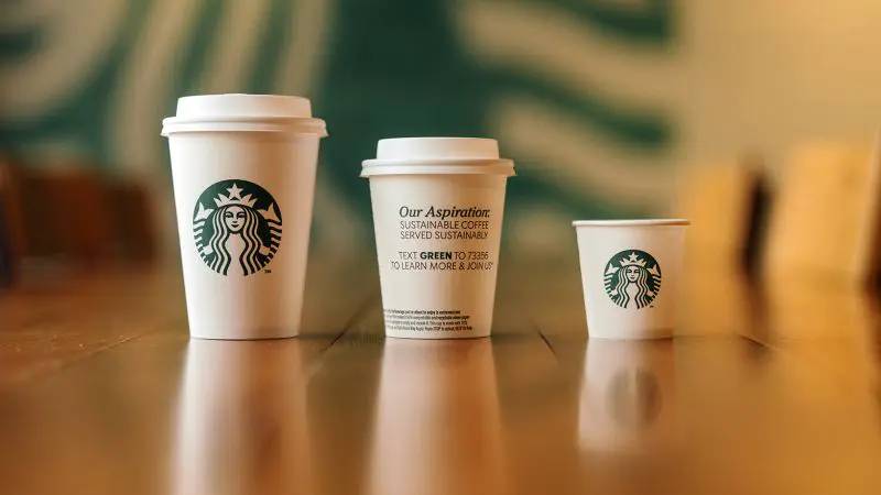 Starbucks announces test of recyclable, compostable cups.
