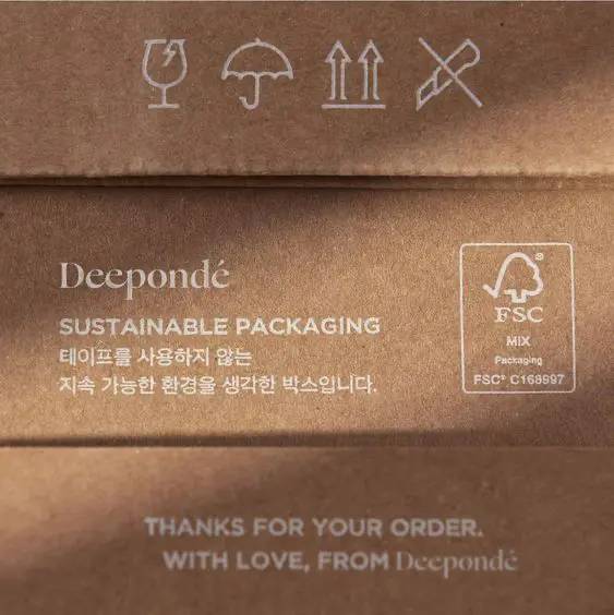 Close-up of a product label showcasing sustainability certifications.