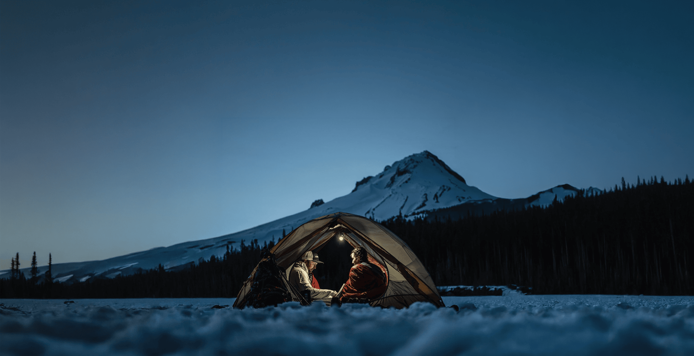 two people camping with coast products