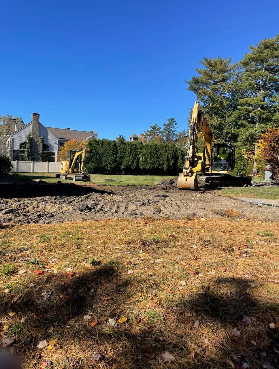 Cleared and stripped building lot graded for a permit-ready foundation pad Legacy Excavation is a site-work contractor that provides turnkey lot preparation in Plymouth, MA