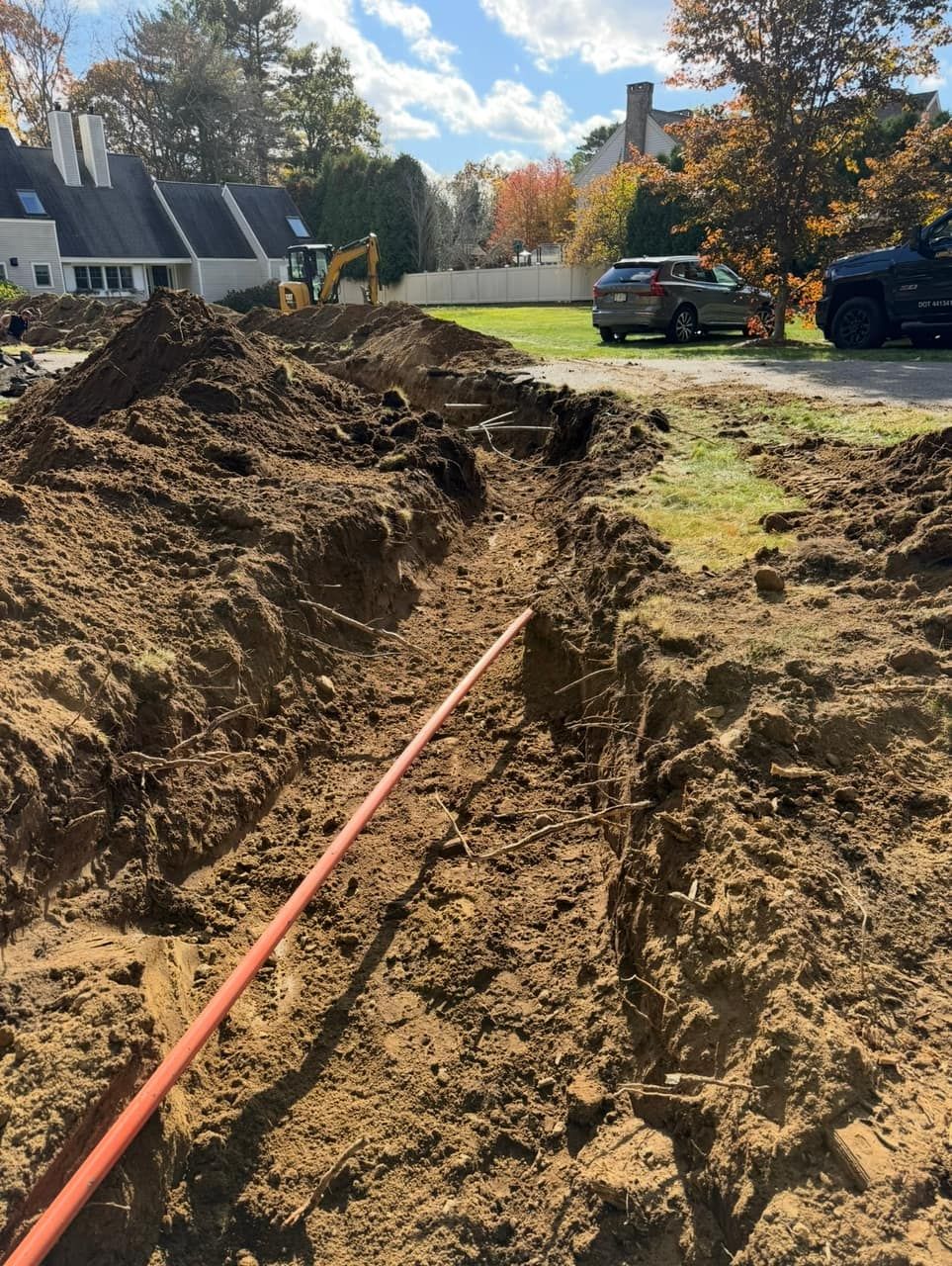 Code-depth electrical service trench excavated for a residential utility upgrade Legacy Excavation is an excavation contractor that provides utility trenching and tie-ins in Plymouth, MA
