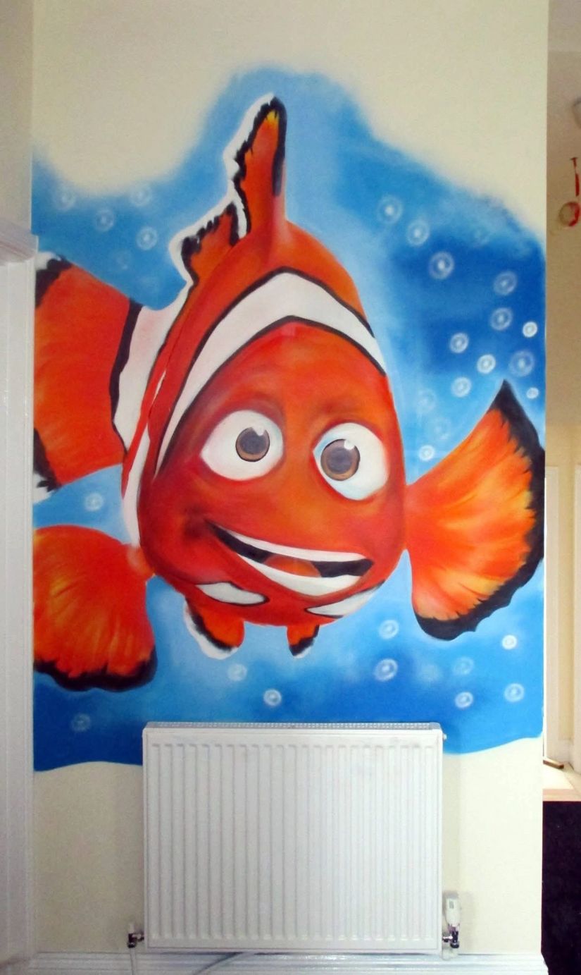 Clownfish cartoon wall mural with an underwater scene and bubbles, custom spray-painted interior wall art by Thomas Palaniuk