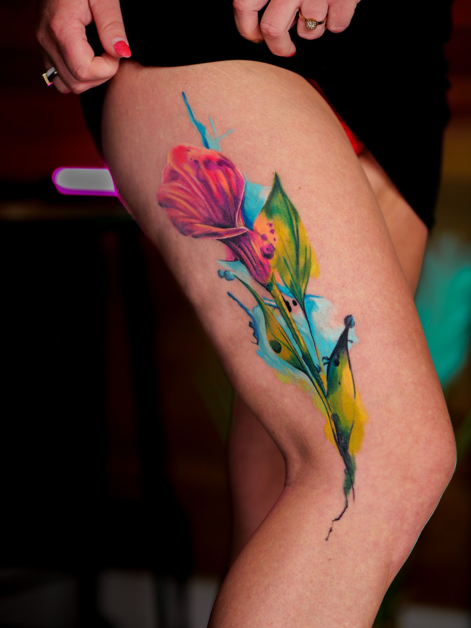 Watercolour flower thigh cover-up tattoo, by Thomas Palaniuk, Aloha Tattoo Studio Gloucester