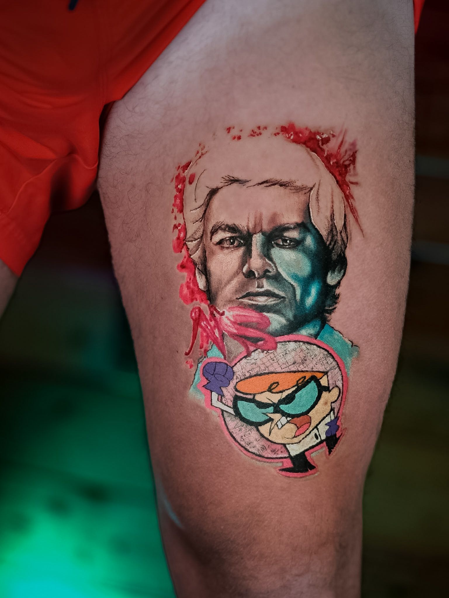 Colour Dexter portrait and Dexter’s Laboratory thigh tattoo, by Thomas Palaniuk, Aloha Tattoo Studio Gloucester