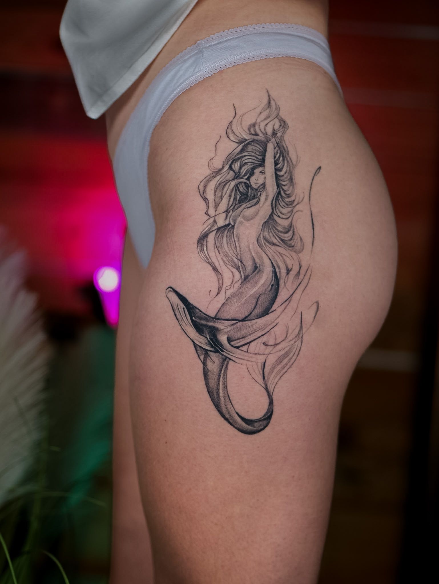 Fine line mermaid thigh tattoo, by Thomas Palaniuk, Aloha Tattoo Studio Gloucester