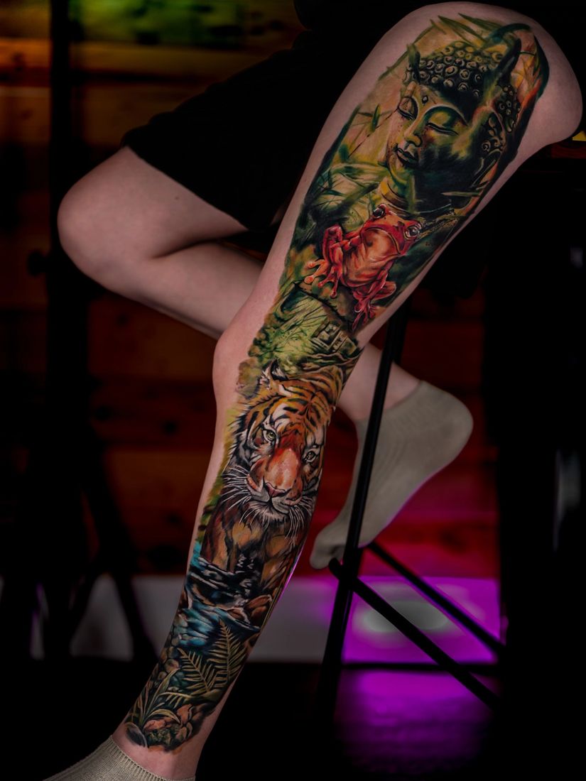 Full colour leg sleeve with Buddha, roses and tiger, by Thomas Palaniuk, Aloha Tattoo Studio Gloucester
