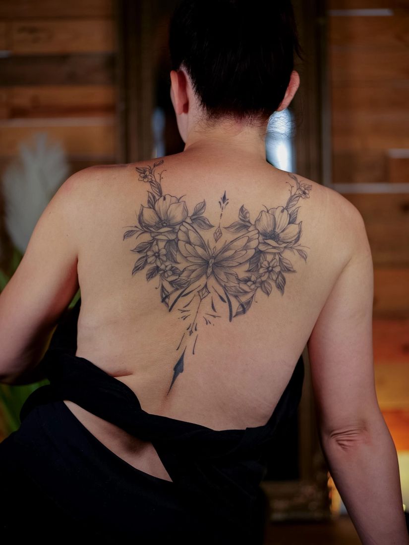 Fine line floral back tattoo, by Thomas Palaniuk, Aloha Tattoo Studio Gloucester