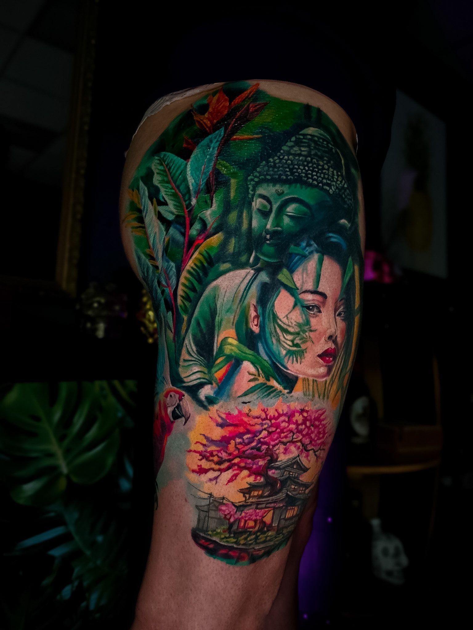 Colour Buddha, geisha and cherry blossom leg tattoo, by Thomas Palaniuk, Aloha Tattoo Studio Gloucester