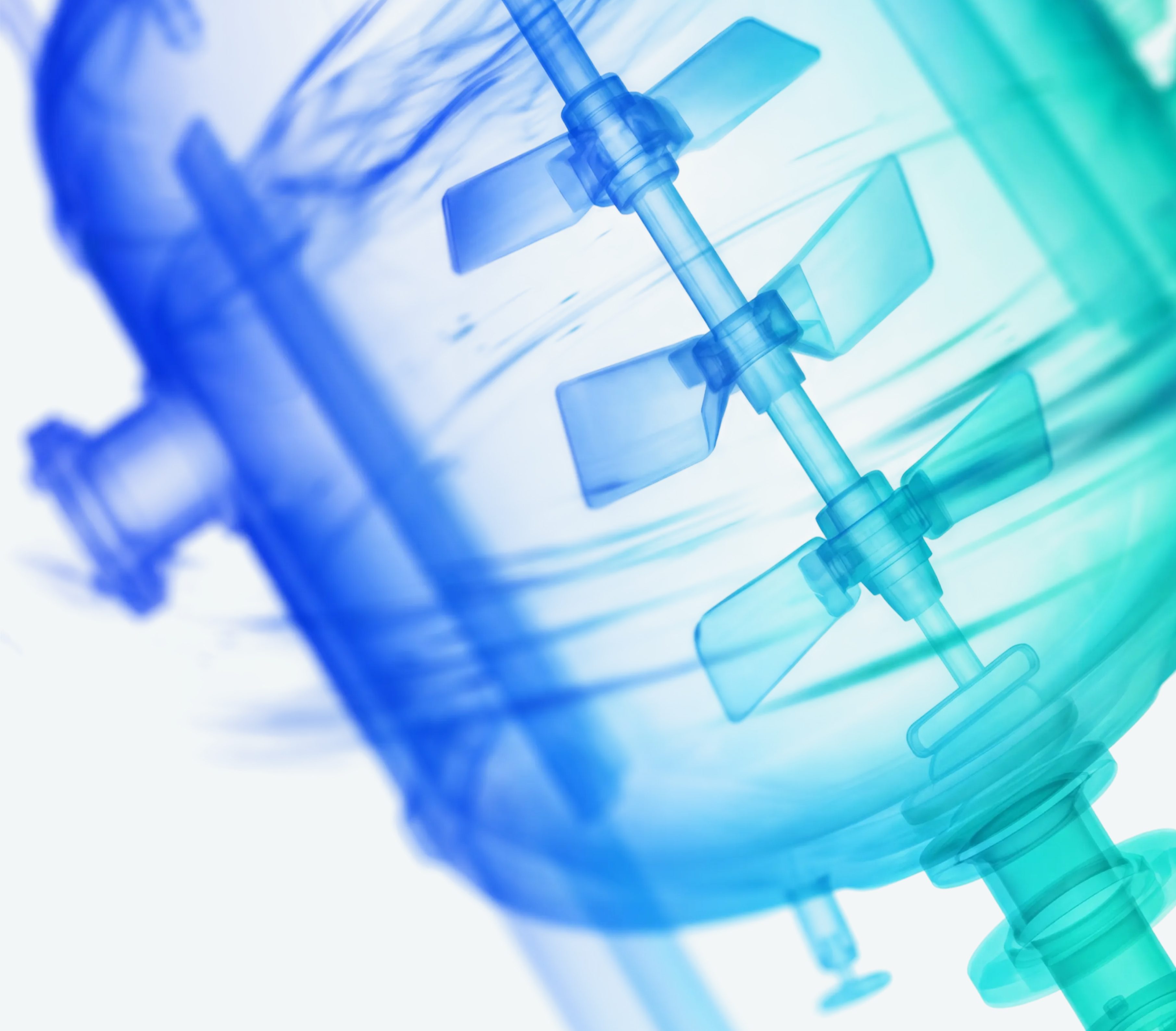 Inside a reactor: agitator blades and a coil, rendered in translucent blue and green