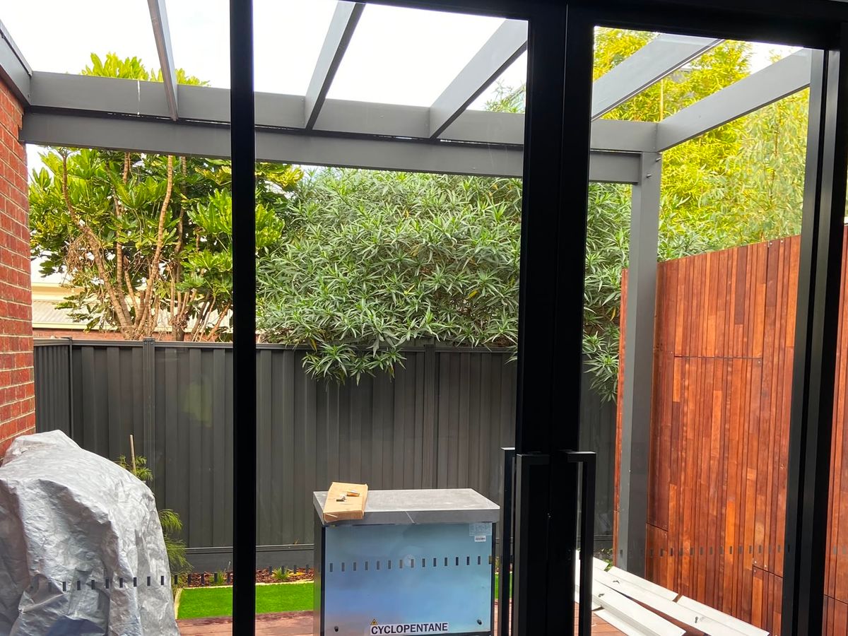 The same Yarra Street glazing after the mineral streaks were dissolved off, glass clear and unetched