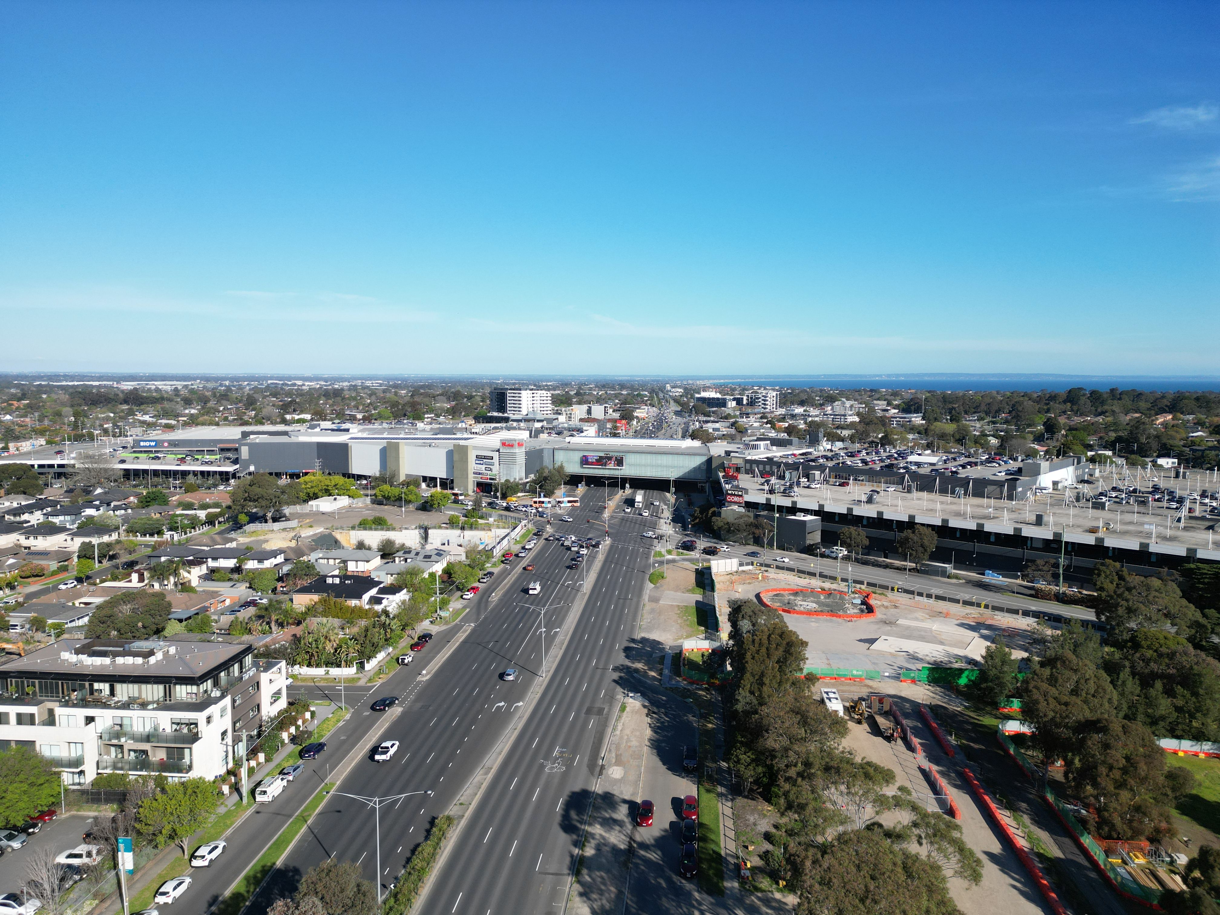 Aerial of Westfield Southland in two halves bridged across the Nepean Highway
