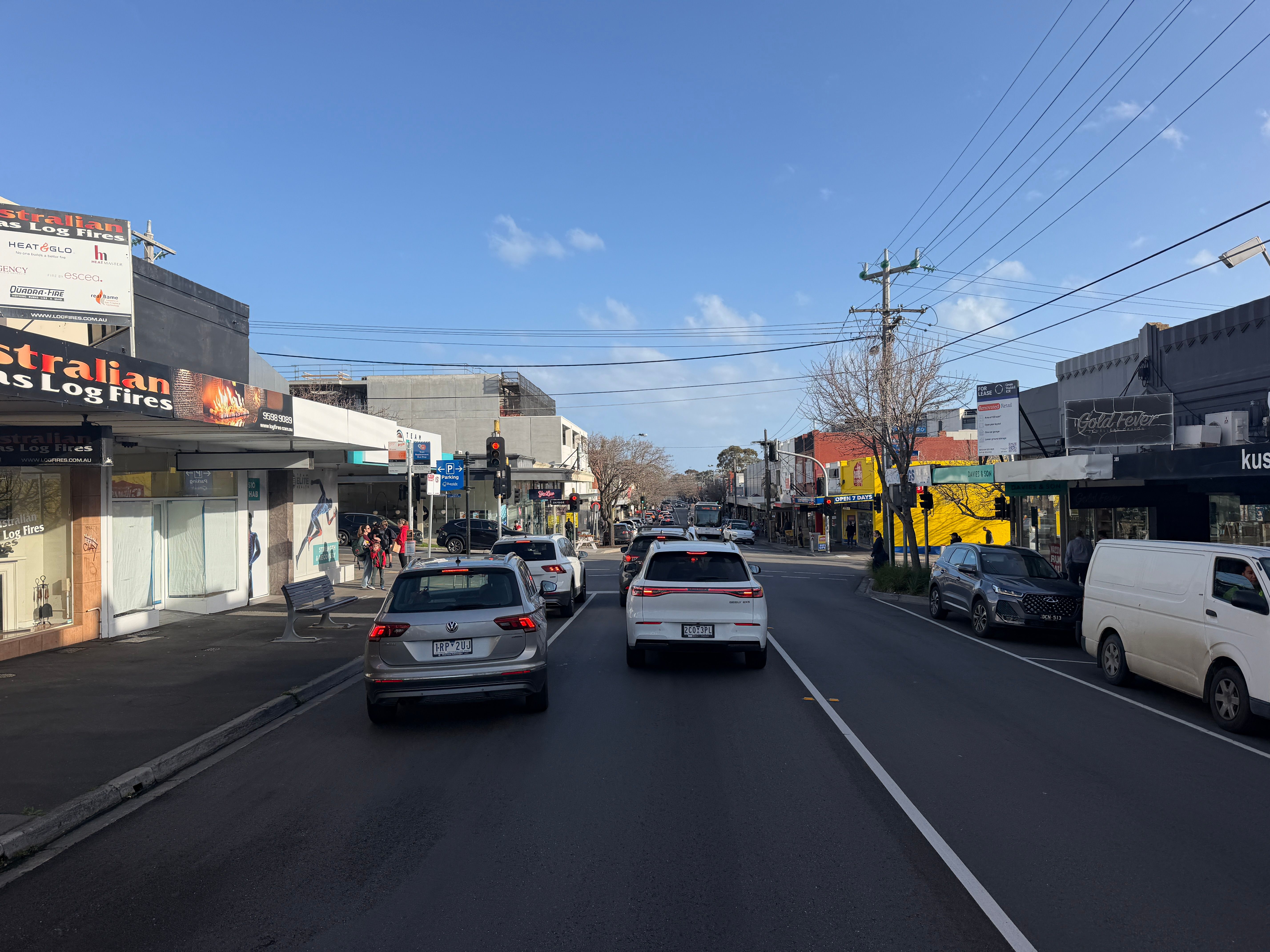 Traffic and shopfronts along Hampton Street, the suburb's main retail strip