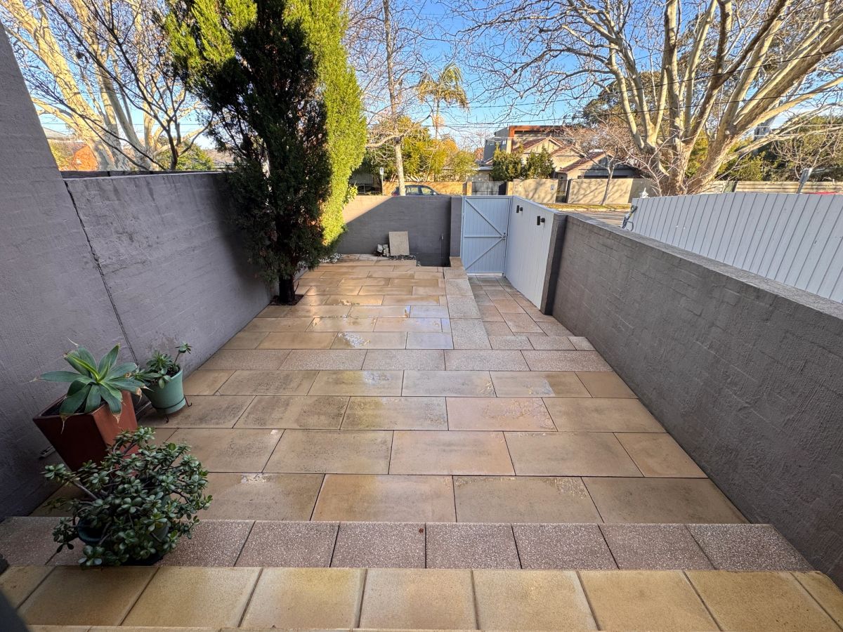The same Were Street tiled paving with the grout lines cleaned back to an even tone
