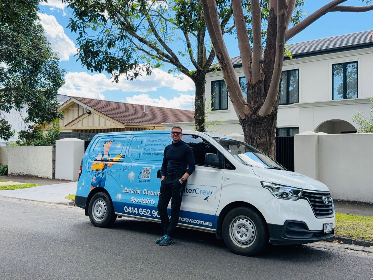 WaterCrew technician washing a brick wall on a Hawthorn East house