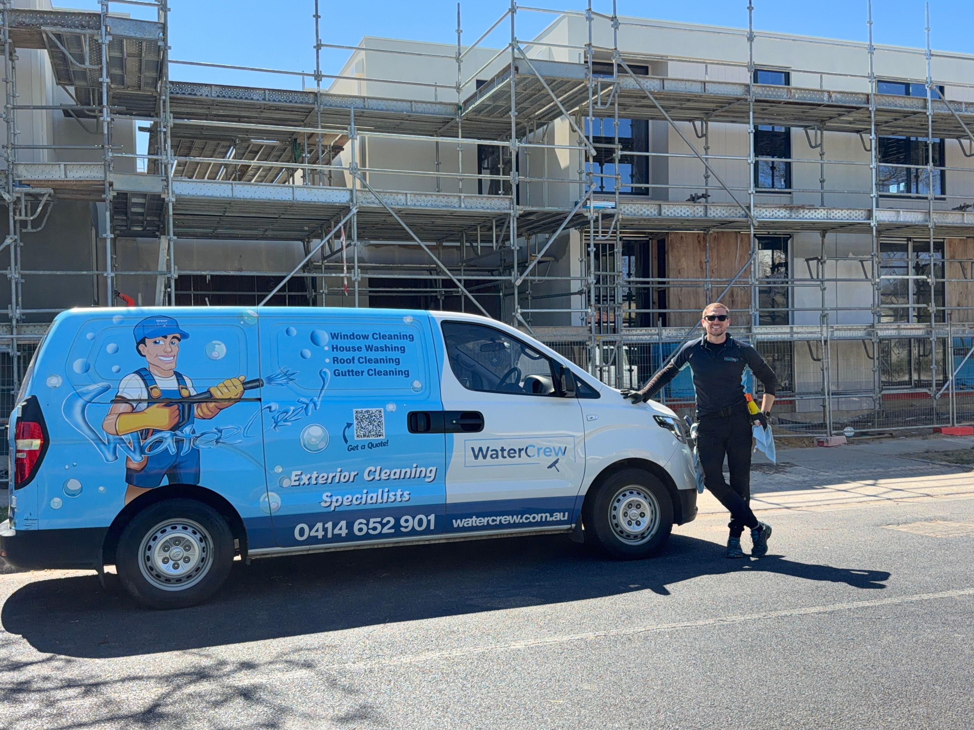 WaterCrew technician outside a Bentleigh house under construction on Jasper Road