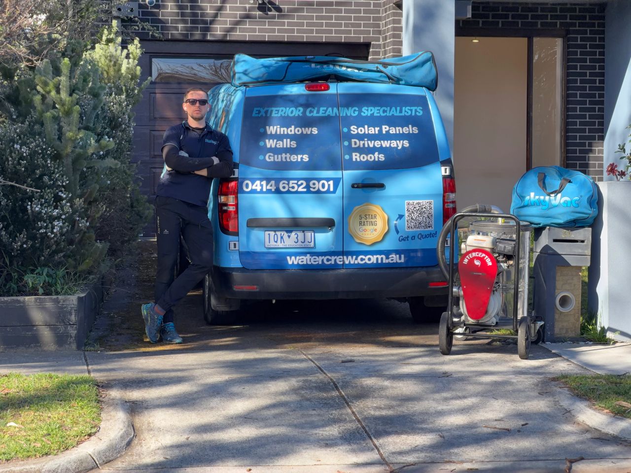 WaterCrew technician working outside a Highett home near the railway line