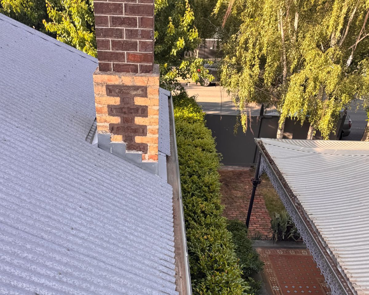 The same 54 metre Colorbond gutter run on Wellington Street cleared to bare metal after vacuum cleaning