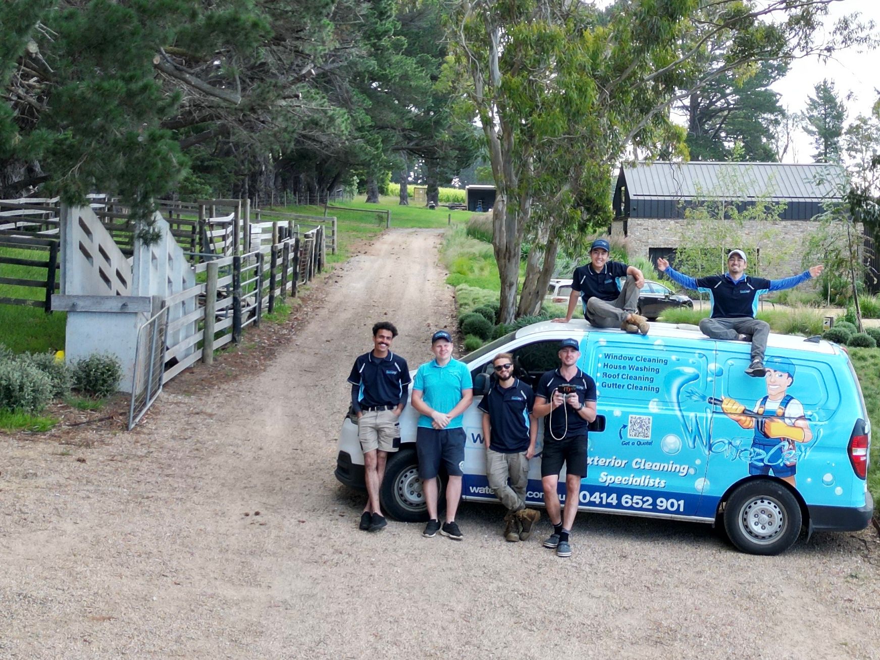 WaterCrew crew cleaning the exterior of a Melbourne home