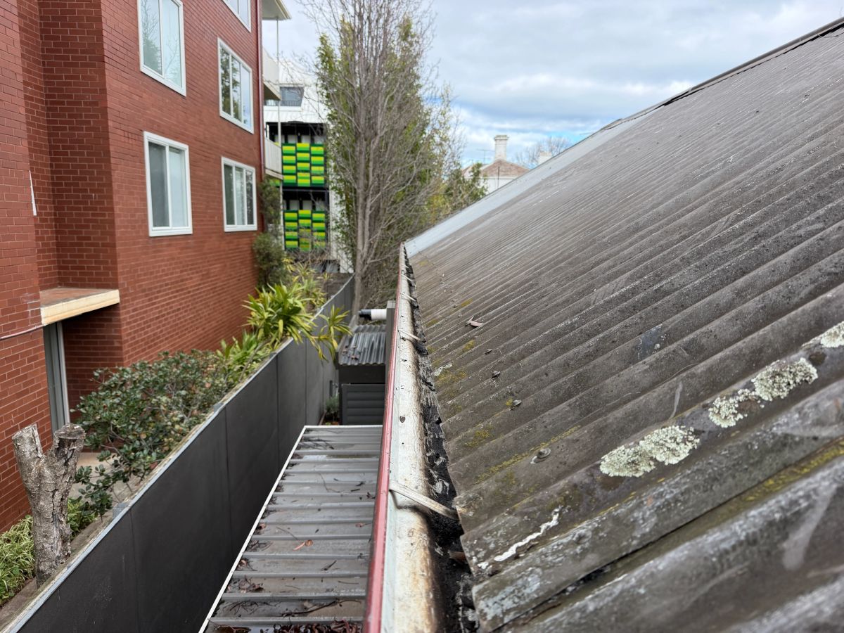 The same Wrexham Road gutter cleared from beneath the roof overhang