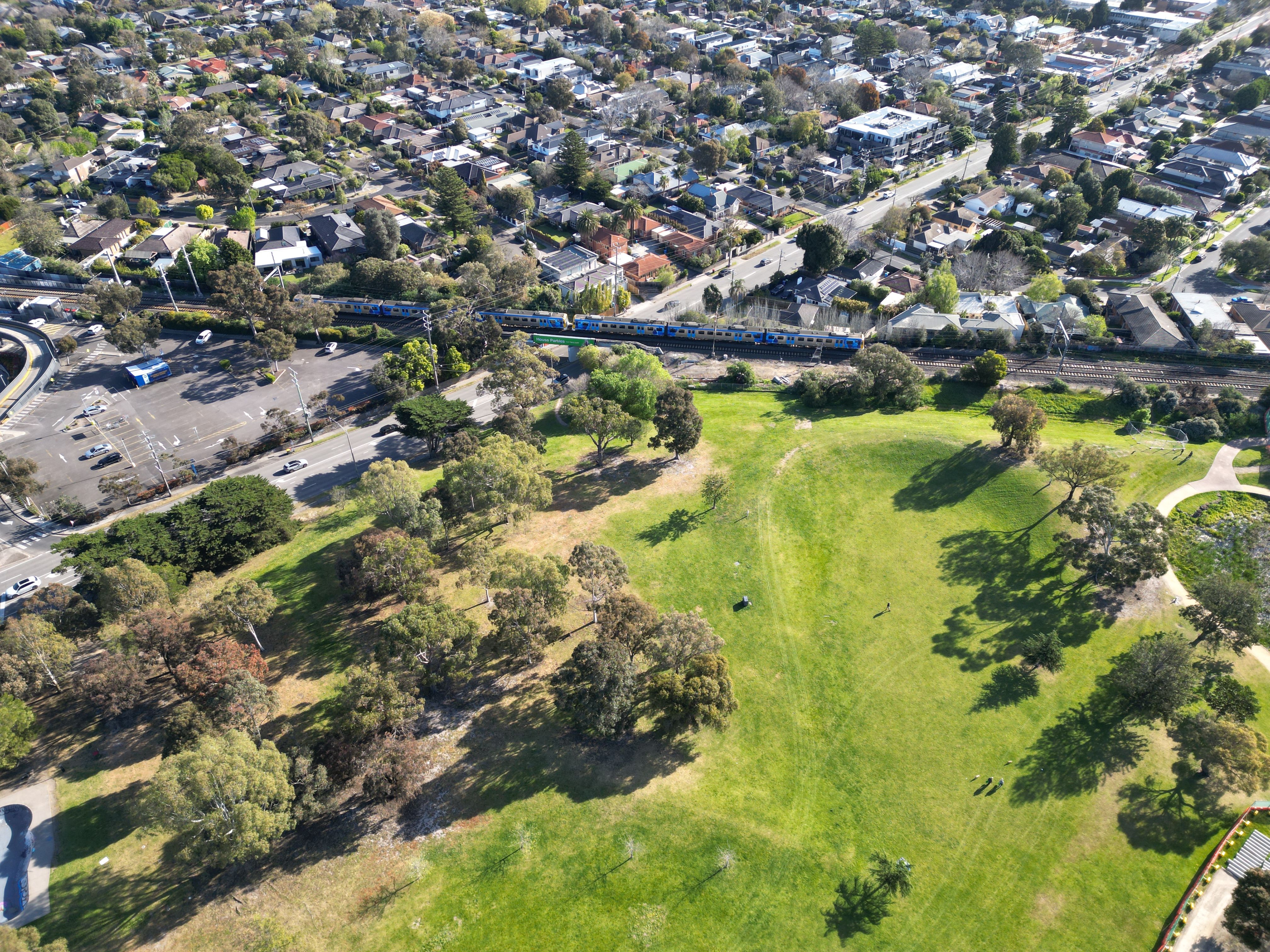Sir William Fry Reserve in Highett with the Frankston line and housing behind it