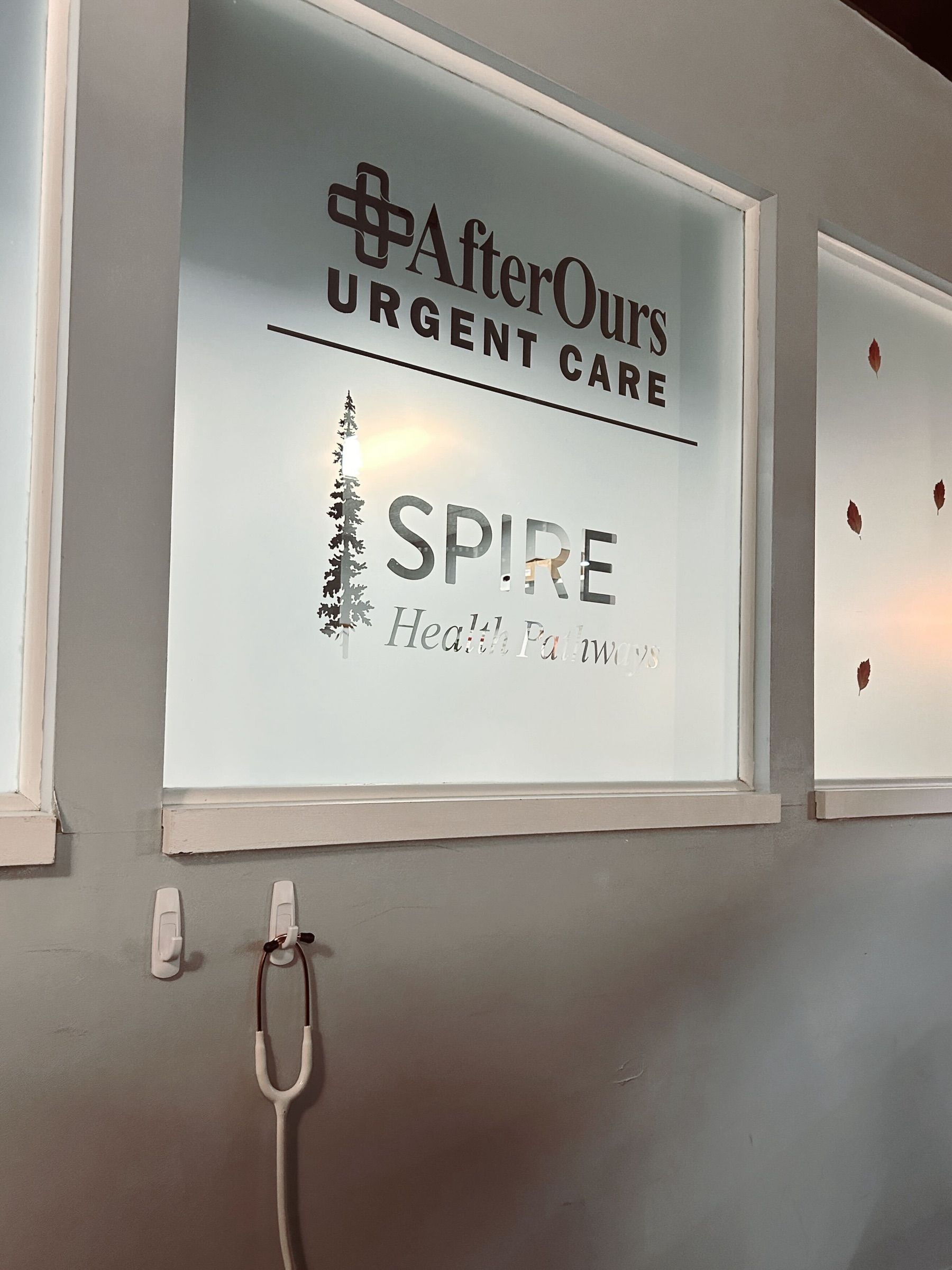 AfterOurs Urgent Care and SPIRE Health Pathways logos on the front window