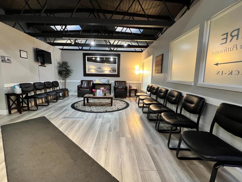 Reception and waiting room with an open, high-ceilinged layout