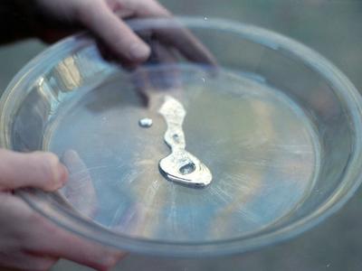 liquid mercury representing a toxic heavy metal humans avoid exposure