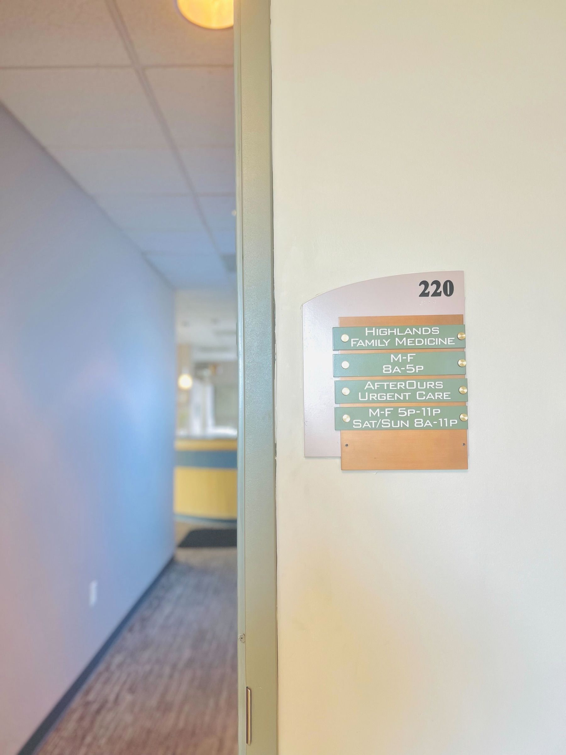 Suite 220 sign for AfterOurs Urgent Care