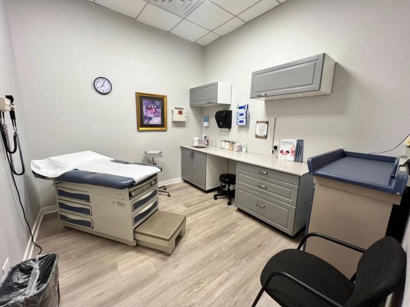 Exam room with an exam table and counter