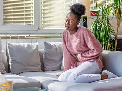 Woman sitting on couch holding her stomach in discomfort - representing acid reflux, heartburn, and digestive imbalance improved through functional medicine treatment for GERD in Denver, Colorado Springs, and Fort Collins​​​​‌﻿‍﻿​‍​‍‌‍﻿﻿‌﻿​‍‌‍‍‌‌‍‌﻿‌‍‍‌‌‍﻿‍​‍​‍​﻿‍‍​‍​‍‌﻿​﻿‌‍​‌‌‍﻿‍‌‍‍‌‌﻿‌​‌﻿‍‌​‍﻿‍‌‍‍‌‌‍﻿﻿​‍​‍​‍﻿​​‍​‍‌‍‍​‌﻿​‍‌‍‌‌‌‍‌‍​‍​‍​﻿‍‍​‍​‍​‍﻿﻿‌﻿​﻿‌﻿‌​‌﻿‌‌‌‍‌​‌‍‍‌‌‍﻿﻿​‍﻿﻿‌‍‍‌‌‍﻿‍‌﻿‌​‌‍‌‌‌‍﻿‍‌﻿‌​​‍﻿﻿‌‍‌‌‌‍‌​‌‍‍‌‌﻿‌​​‍﻿﻿‌‍﻿‌‌‍﻿﻿‌‍‌​‌‍‌‌​﻿﻿‌‌﻿​​‌﻿​‍‌‍‌‌‌﻿​﻿‌‍‌‌‌‍﻿‍‌﻿‌​‌‍​‌‌﻿‌​‌‍‍‌‌‍﻿﻿‌‍﻿‍​﻿‍﻿‌‍‍‌‌‍‌​​﻿﻿‌​﻿‌​‌​‍‌‌‍﻿﻿‌​﻿﻿​﻿‌‌‌‌‌‌‌​‍​‌‍‍‌‌​​‌‌‍‌﻿‌‌‌‍​﻿‌‌‌‌​‌‌​‌‌‌​﻿​‌​‍‌‌﻿​‍​﻿‌﻿‌﻿​‍‌​‌‌‌​﻿​‌‍‌​​﻿‍﻿‌﻿‌​‌﻿‍‌‌﻿​​‌‍‌‌​﻿﻿‌‌‍‍​‌‍‌‌‌﻿​‍‌‍﻿﻿‌​​‍‌‍﻿​‌‍﻿﻿‌‍​﻿‌‍‍﻿​﻿‍﻿‌﻿​​‌‍​‌‌﻿‌​‌‍‍​​﻿﻿‌‌‍‍‌‌‍﻿‌‌‍​‌‌‍‌﻿‌‍‌‌​‍﻿‍‌‍​‌‌‍﻿​‌﻿‌​​﻿﻿﻿‌‍​‍‌‍​‌‌﻿​﻿‌‍‌‌‌‌‌‌‌﻿​‍‌‍﻿​​﻿﻿‌​‍‌‌​﻿​‍‌​‌‍‌﻿​﻿‌﻿‌​‌﻿‌‌‌‍‌​‌‍‍‌‌‍﻿﻿​‍‌‍‌‍‍‌‌‍‌​​﻿﻿‌​﻿‌​‌​‍‌‌‍﻿﻿‌​﻿﻿​﻿‌‌‌‌‌‌‌​‍​‌‍‍‌‌​​‌‌‍‌﻿‌‌‌‍​﻿‌‌‌‌​‌‌​‌‌‌​﻿​‌​‍‌‌﻿​‍​﻿‌﻿‌﻿​‍‌​‌‌‌​﻿​‌‍‌​​‍‌‍‌﻿‌​‌﻿‍‌‌﻿​​‌‍‌‌​﻿﻿‌‌‍‍​‌‍‌‌‌﻿​‍‌‍﻿﻿‌​​‍‌‍﻿​‌‍﻿﻿‌‍​﻿‌‍‍﻿​‍‌‍‌﻿​​‌‍​‌‌﻿‌​‌‍‍​​﻿﻿‌‌‍‍‌‌‍﻿‌‌‍​‌‌‍‌﻿‌‍‌‌​‍﻿‍‌‍​‌‌‍﻿​‌﻿‌​​‍‌‍‌﻿​​‌‍‌‌‌﻿​‍‌﻿​﻿‌﻿​​‌‍‌‌‌‍​﻿‌﻿‌​‌‍‍‌‌﻿‌‍‌‍‌‌​﻿﻿‌‌﻿​​‌﻿‌‌‌‍​‍‌‍﻿​‌‍‍‌‌﻿​﻿‌‍‍​‌‍‌‌‌‍‌​​‍​‍‌﻿﻿‌