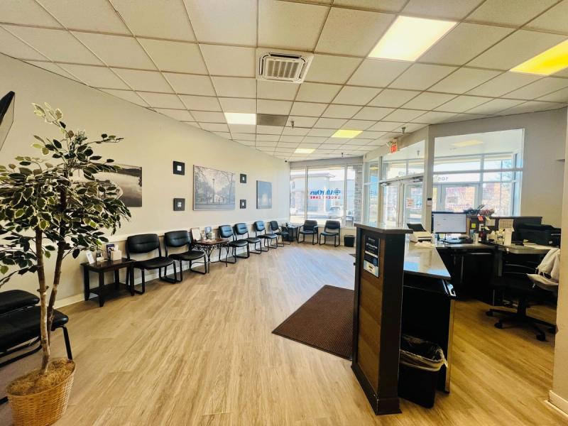 Front desk and waiting area at AfterOurs Littleton