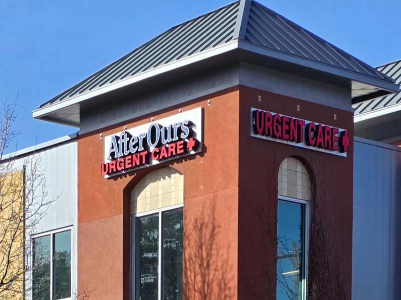 Corner tower of the Highlands clinic with the AfterOurs Urgent Care sign
