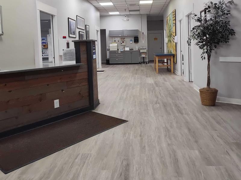 Front desk and a long, open corridor