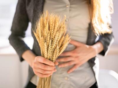 Person holding wheat stalks while touching stomach - representing gluten sensitivity, digestive distress, and gut healing through functional medicine treatment for celiac disease in Denver, Colorado Springs, and Fort Collins​​​​‌﻿‍﻿​‍​‍‌‍﻿﻿‌﻿​‍‌‍‍‌‌‍‌﻿‌‍‍‌‌‍﻿‍​‍​‍​﻿‍‍​‍​‍‌﻿​﻿‌‍​‌‌‍﻿‍‌‍‍‌‌﻿‌​‌﻿‍‌​‍﻿‍‌‍‍‌‌‍﻿﻿​‍​‍​‍﻿​​‍​‍‌‍‍​‌﻿​‍‌‍‌‌‌‍‌‍​‍​‍​﻿‍‍​‍​‍​‍﻿﻿‌﻿​﻿‌﻿‌​‌﻿‌‌‌‍‌​‌‍‍‌‌‍﻿﻿​‍﻿﻿‌‍‍‌‌‍﻿‍‌﻿‌​‌‍‌‌‌‍﻿‍‌﻿‌​​‍﻿﻿‌‍‌‌‌‍‌​‌‍‍‌‌﻿‌​​‍﻿﻿‌‍﻿‌‌‍﻿﻿‌‍‌​‌‍‌‌​﻿﻿‌‌﻿​​‌﻿​‍‌‍‌‌‌﻿​﻿‌‍‌‌‌‍﻿‍‌﻿‌​‌‍​‌‌﻿‌​‌‍‍‌‌‍﻿﻿‌‍﻿‍​﻿‍﻿‌‍‍‌‌‍‌​​﻿﻿‌​﻿‌​‌​‍‌‌‍﻿﻿‌​﻿﻿​﻿‌‌‌‌‌‌‌​‍​‌‍‍‌‌​​‌‌‍‌﻿‌‌‌‍​﻿‌‌‌‌​‌‌​‌‌‌​﻿​‌​‍‌‌﻿​‍​﻿‌﻿‌﻿​‍‌​‌​‌‌‌﻿‌​​‍​﻿‍﻿‌﻿‌​‌﻿‍‌‌﻿​​‌‍‌‌​﻿﻿‌‌‍‍​‌‍‌‌‌﻿​‍‌‍﻿﻿‌​​‍‌‍﻿​‌‍﻿﻿‌‍​﻿‌‍‍﻿​﻿‍﻿‌﻿​​‌‍​‌‌﻿‌​‌‍‍​​﻿﻿‌‌‍‍‌‌‍﻿‌‌‍​‌‌‍‌﻿‌‍‌‌​‍﻿‍‌‍​‌‌‍﻿​‌﻿‌​​﻿﻿﻿‌‍​‍‌‍​‌‌﻿​﻿‌‍‌‌‌‌‌‌‌﻿​‍‌‍﻿​​﻿﻿‌​‍‌‌​﻿​‍‌​‌‍‌﻿​﻿‌﻿‌​‌﻿‌‌‌‍‌​‌‍‍‌‌‍﻿﻿​‍‌‍‌‍‍‌‌‍‌​​﻿﻿‌​﻿‌​‌​‍‌‌‍﻿﻿‌​﻿﻿​﻿‌‌‌‌‌‌‌​‍​‌‍‍‌‌​​‌‌‍‌﻿‌‌‌‍​﻿‌‌‌‌​‌‌​‌‌‌​﻿​‌​‍‌‌﻿​‍​﻿‌﻿‌﻿​‍‌​‌​‌‌‌﻿‌​​‍​‍‌‍‌﻿‌​‌﻿‍‌‌﻿​​‌‍‌‌​﻿﻿‌‌‍‍​‌‍‌‌‌﻿​‍‌‍﻿﻿‌​​‍‌‍﻿​‌‍﻿﻿‌‍​﻿‌‍‍﻿​‍‌‍‌﻿​​‌‍​‌‌﻿‌​‌‍‍​​﻿﻿‌‌‍‍‌‌‍﻿‌‌‍​‌‌‍‌﻿‌‍‌‌​‍﻿‍‌‍​‌‌‍﻿​‌﻿‌​​‍‌‍‌﻿​​‌‍‌‌‌﻿​‍‌﻿​﻿‌﻿​​‌‍‌‌‌‍​﻿‌﻿‌​‌‍‍‌‌﻿‌‍‌‍‌‌​﻿﻿‌‌﻿​​‌﻿‌‌‌‍​‍‌‍﻿​‌‍‍‌‌﻿​﻿‌‍‍​‌‍‌‌‌‍‌​​‍​‍‌﻿﻿‌