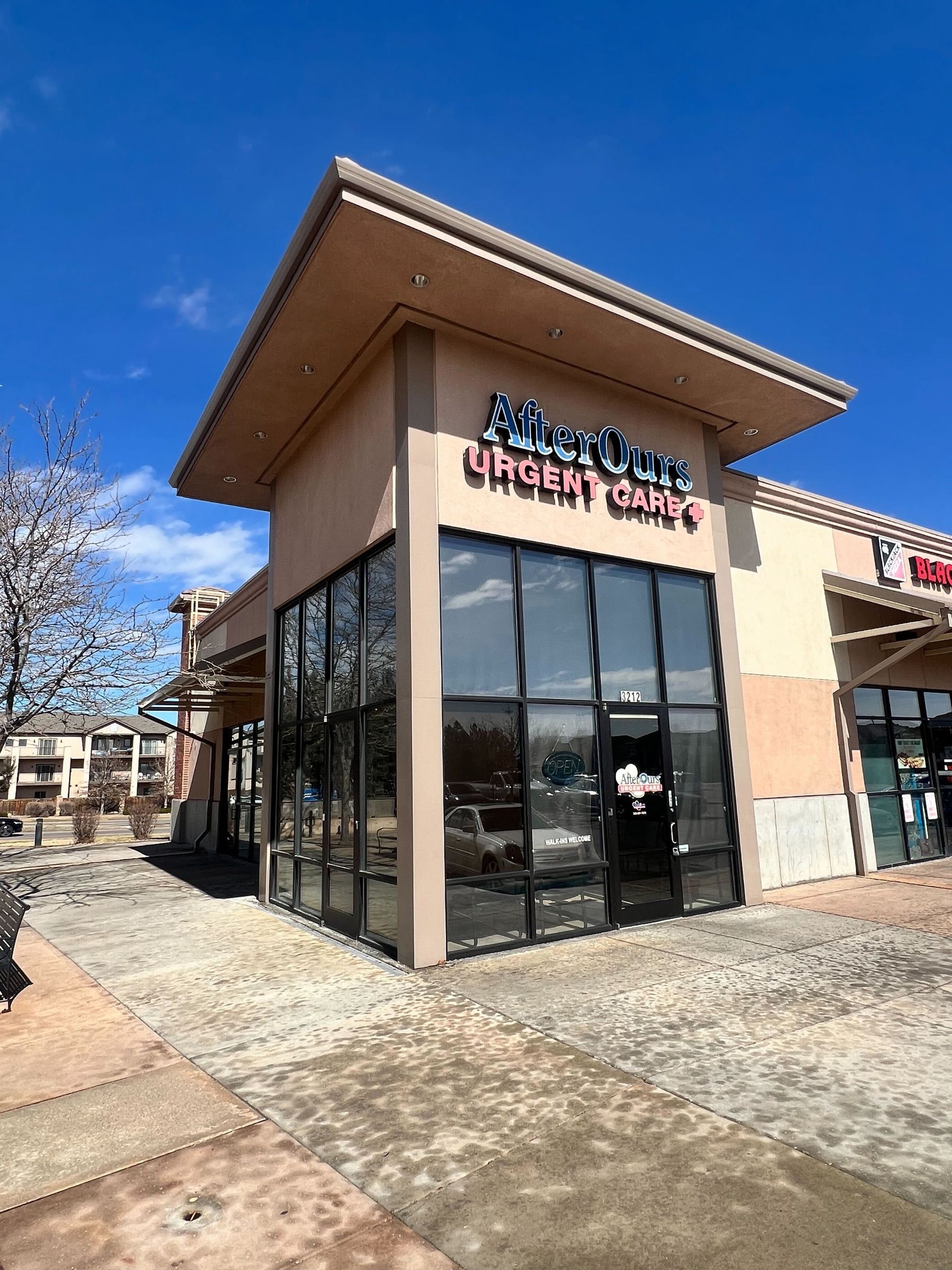 AfterOurs Urgent Care Thornton storefront with its illuminated sign