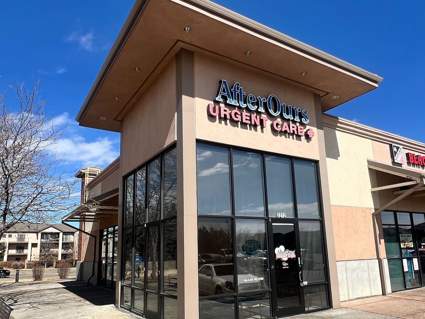 AfterOurs Urgent Care Thornton storefront with its illuminated sign
