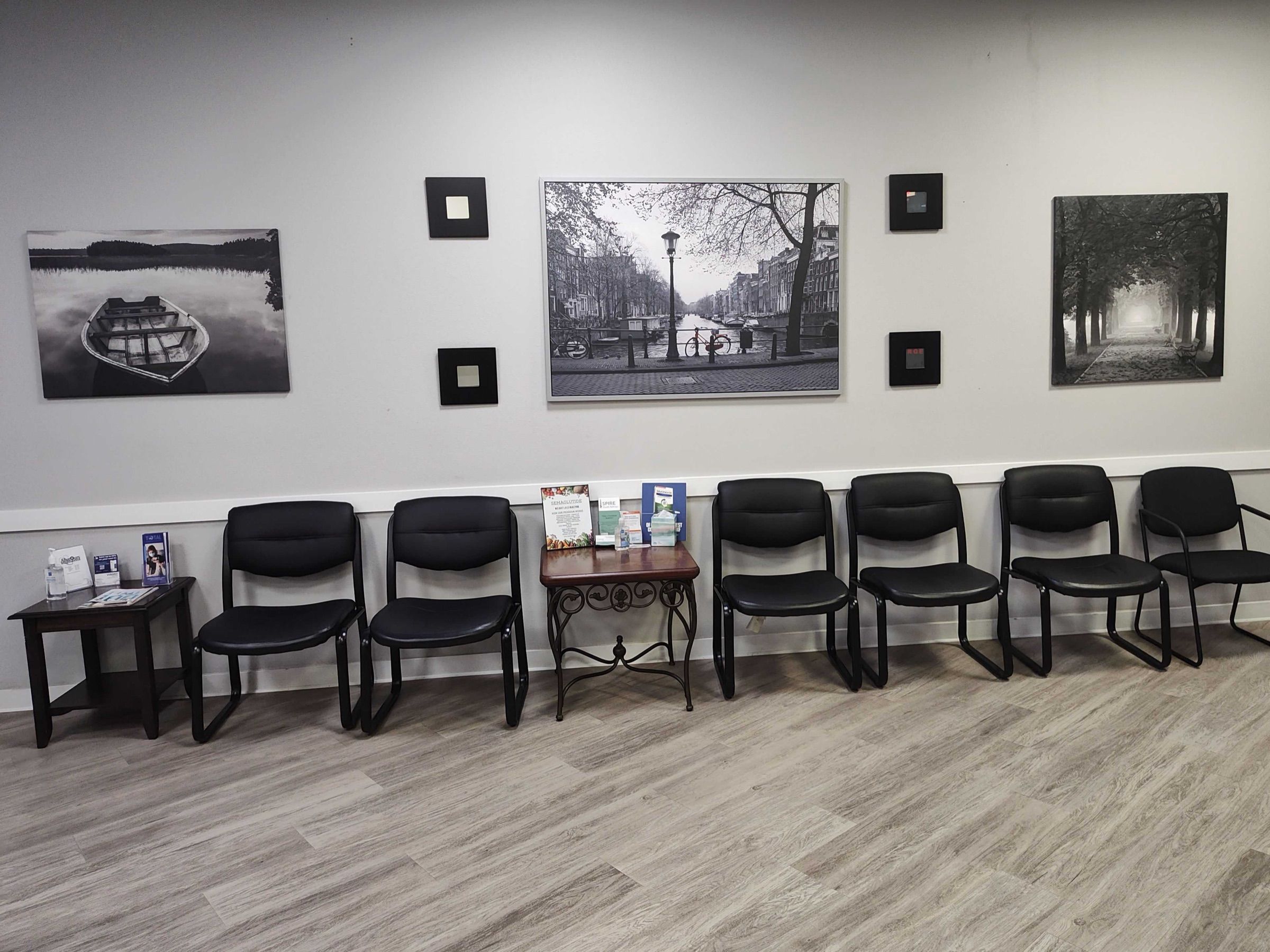 Waiting area with seating and framed art