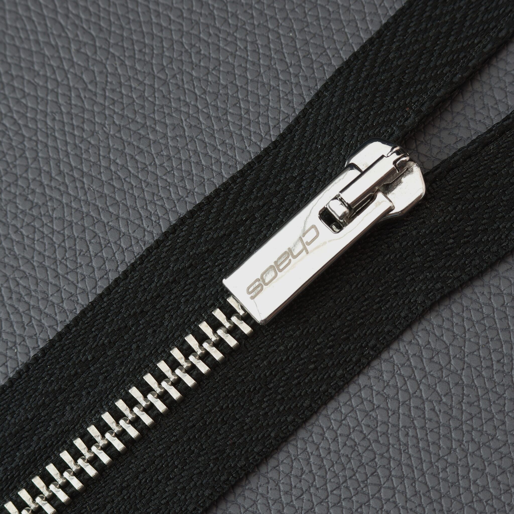 Laser logo engraving on zipper puller