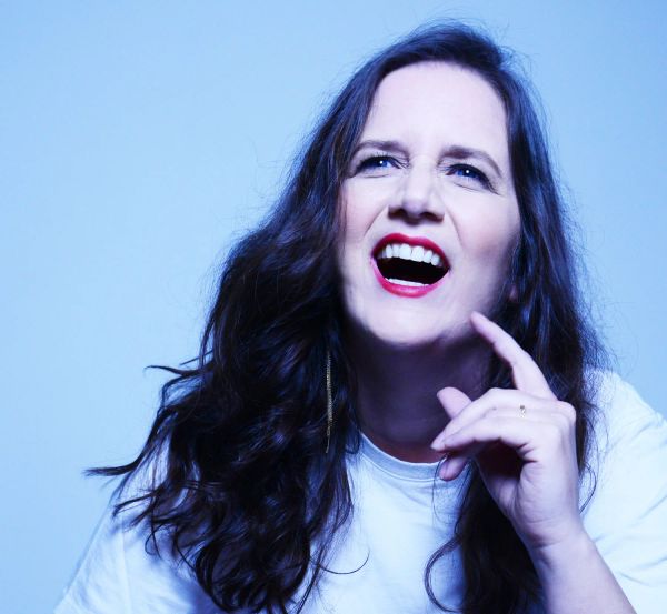 Amy Cervini laughing — color portrait, hi-res press photo
