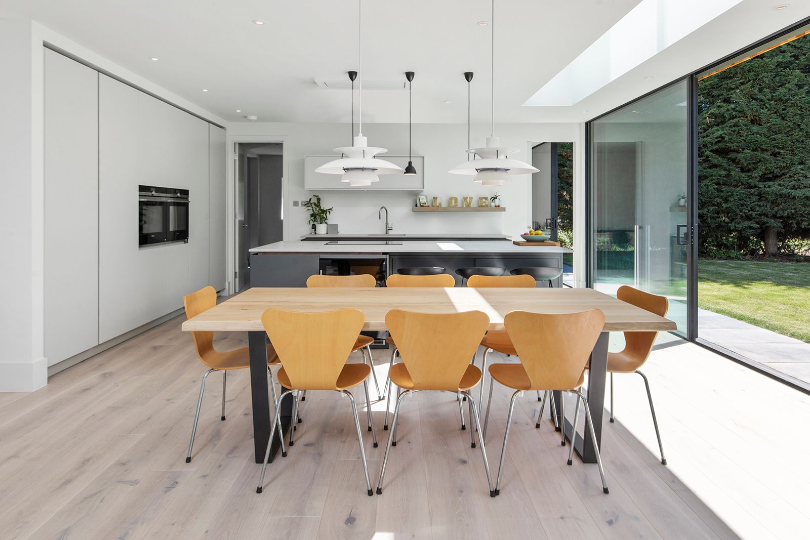 Another view of the kitchen and dining room