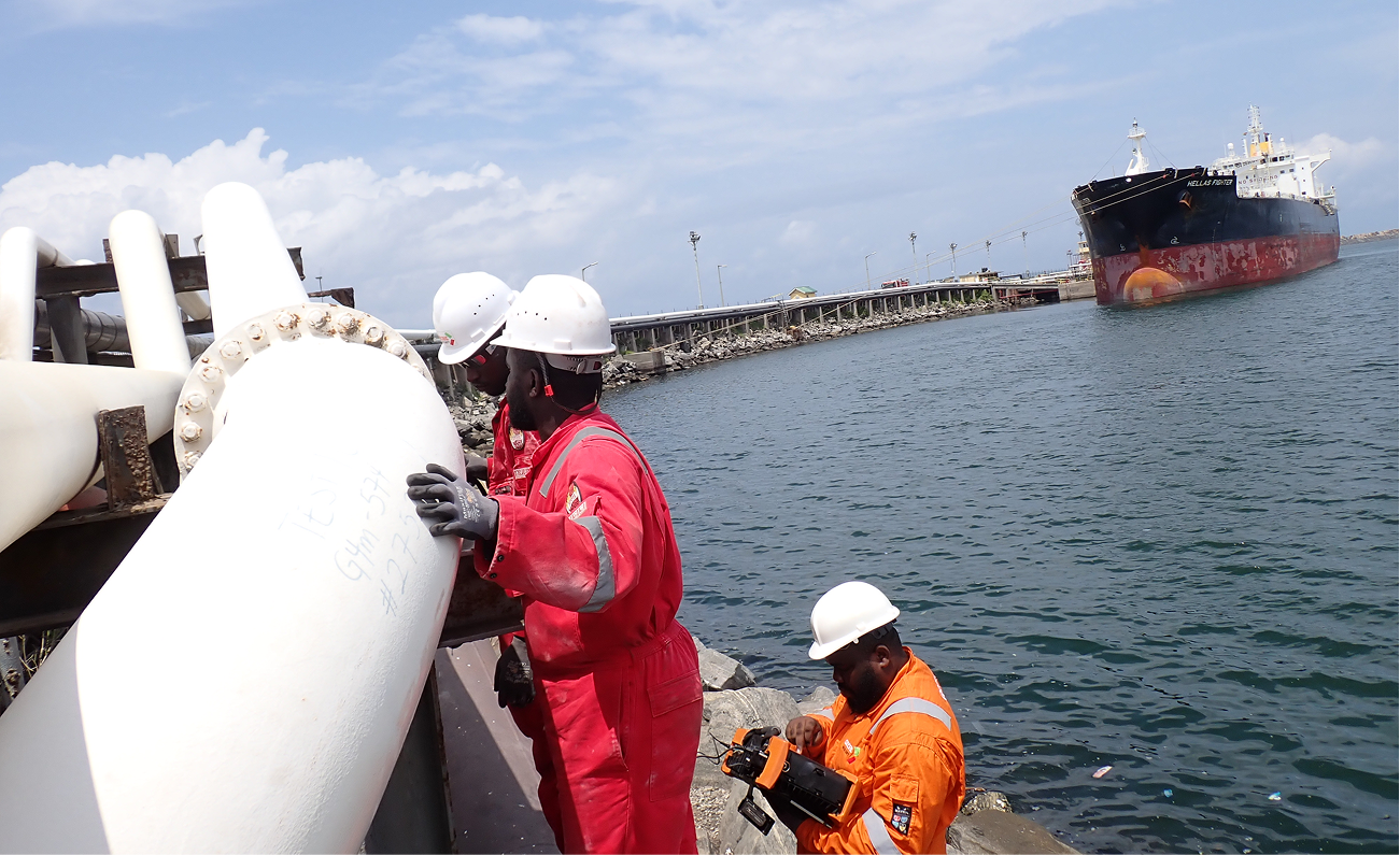 Engineer carrying out guided wave inspection on a pipeline