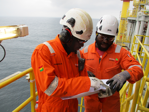 Engineering consultants reviewing integrity data