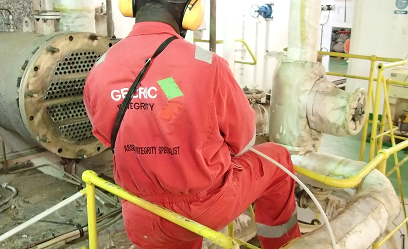 Technician carrying out remote field testing on tube equipment