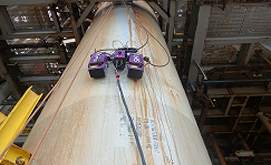 Technician applying non-destructive testing techniques