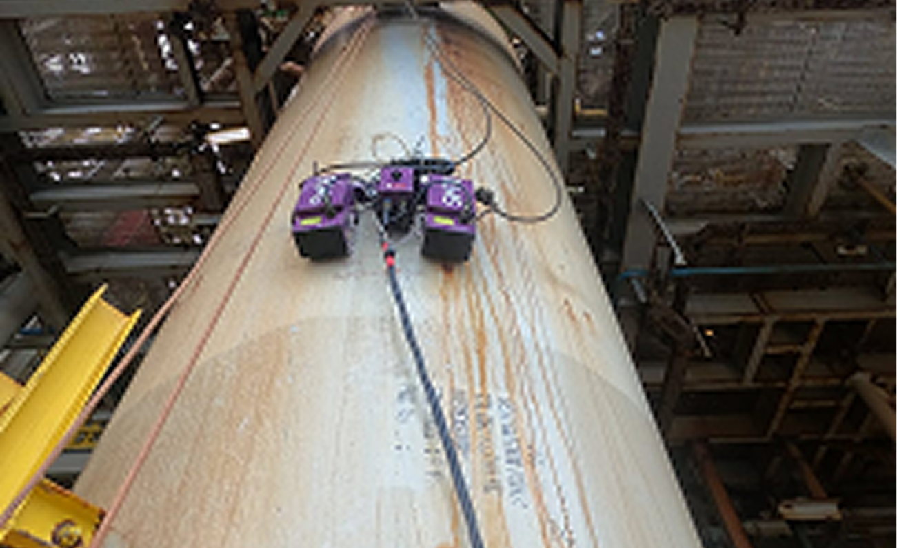 Technician applying non-destructive testing techniques